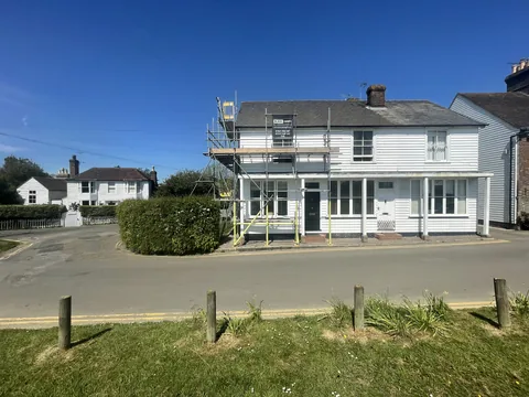 Grade II listed property on The Moor, Hawkhurst after weatherboard repair and repainting