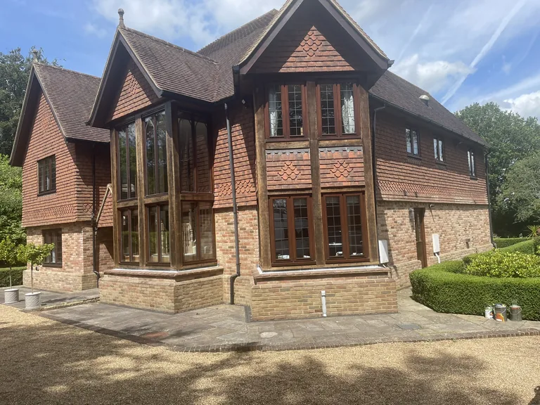 Oak window frames finished with Osmo clear varnish at a magnificent Hawkhurst property