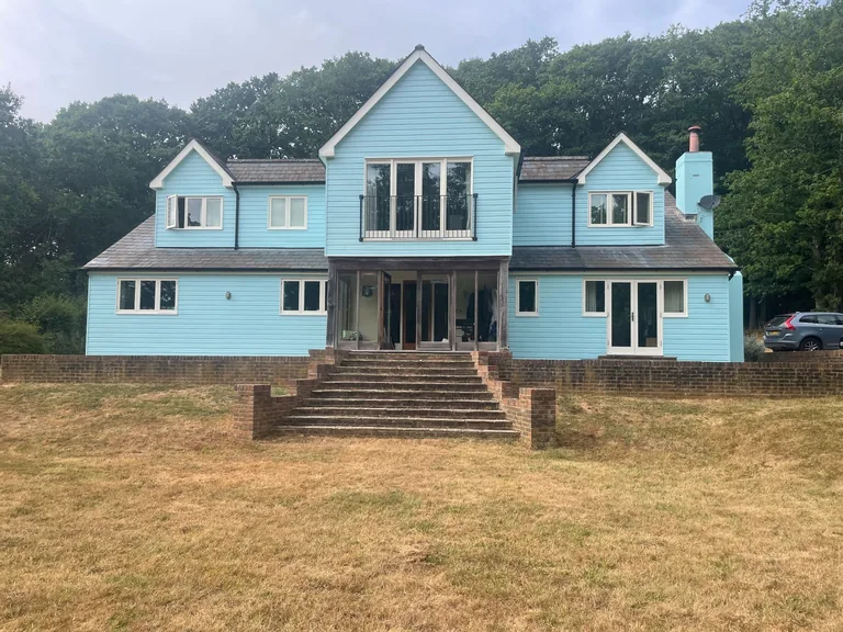 Large Biddenden weatherboarded property after exterior restoration